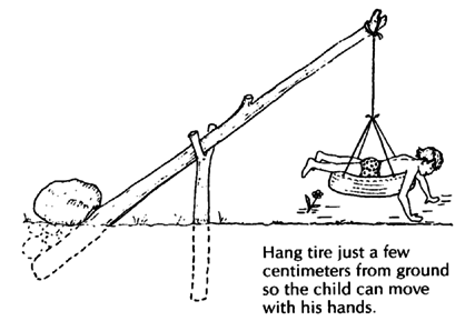 Hang tire just a few centimeters from ground so the child can move with his hands.