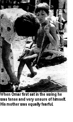 When Omar first sat in the swing he was tense and very unsure of himself. His mother was equally fearful.