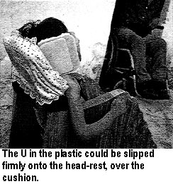 The U in the plastic could be slipped firmly onto the head-rest, over the cushion.