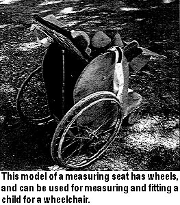 This model of a measuring seat has wheels, and can be used for measuring and fitting a child for a wheelchair.