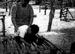 Tinin slumped forward when he sat on a wood.