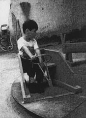 Tinin tried hard to sit upright.
