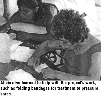 Alicia also learned to help with the project's work, such as folding bandages for treatment of pressure sores.