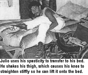 Julio uses his spasticity to transfer to his bed. He shakes his thigh, which causes his knee to straighten stiffly so he can lift it onto the bed.