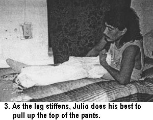 3. As the leg stiffens, Julio does his best to pull up the top of the pants.
