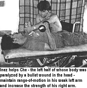 Inez helps Che - the left half of whose body was paralyzed by a bullet wound in the head - maintain range-of-motion in his weak left arm and increase the strength of his right arm.