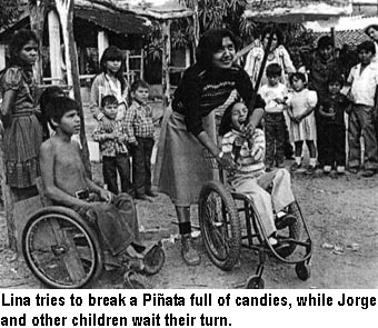 Lina tries to break a Piñata full of candies, while Jorge and other children wait their turn.