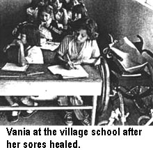 Vania at the village school after her sores healed.