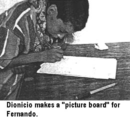 Dionicio makes a "picture board" for Fernando.