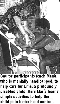 Course participants teach Maria, who is mentally handicapped, to help care for Ema, a profoundly disabled child. Here Maria learns simple activities to help the child gain better head control.