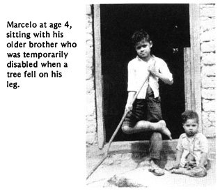 Marcelo at age 4, sitting with his older brother who was temporarily disabled when a tree fell on his leg.