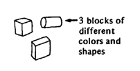 3 blocks of different colors and shapes.