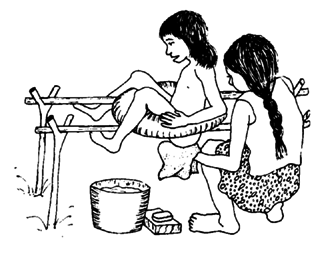 An inner tube on poles holds child in a good position for washing.