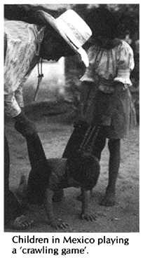 Children in Mexico playing a 'crawling game'.