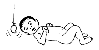Hang a bright colored object in front of the baby's face and move it from side to side