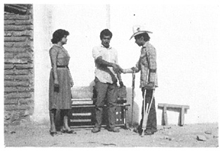 A disabled young man arrives at Ajoya and asks diredtions to the village health center.