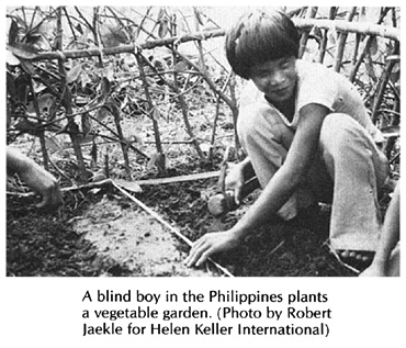 A blind boy in the Phillippines plants a vegetable garden. 