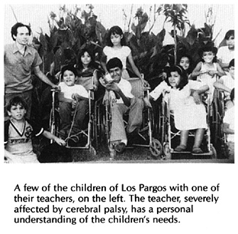 A few of the children of Los Pargos with one of their teachers, on the left.