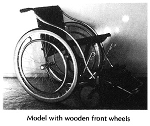 Model with wooden front wheels.