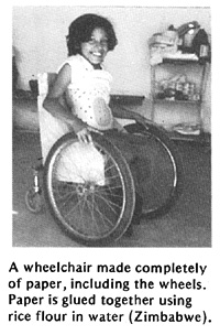 A wheelchair made completely of paper, including the wheels.