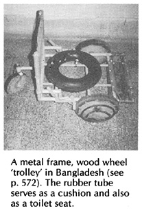 A metal frame, wood wheel 'trolley' in Bangladesh.