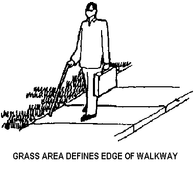 Grass area defines edge of walkway