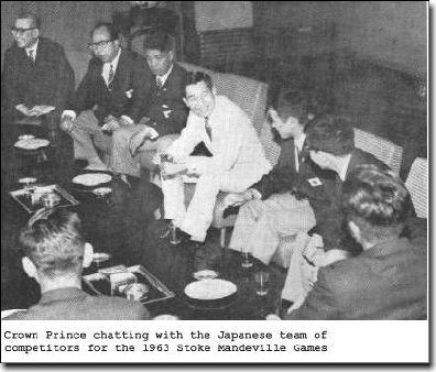 Crown Prince chatting with the Japanese team of competitors for the 1963 Stoke Mandeville Games