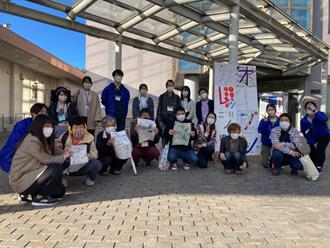 Photo of the people involved and a signboard