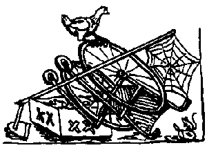 A wheelchair is thrown out with a spider web on it.