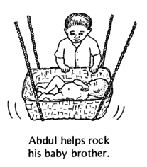 Abdul helps rock his baby brother.
