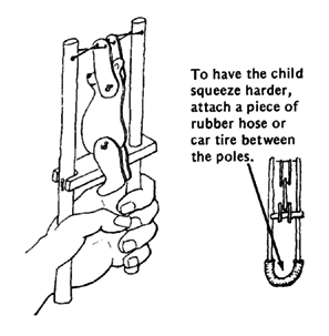 To have the child squeeze harder, attach a piece of rubber hose.